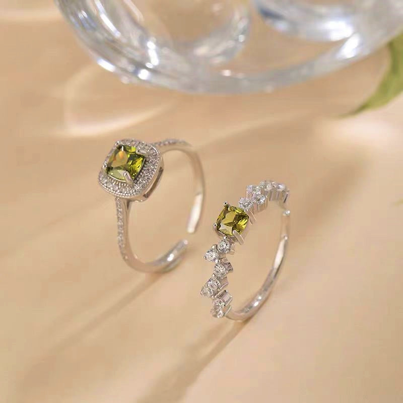 Sterling Silver Diamonds And Olive Green Zircon Rings