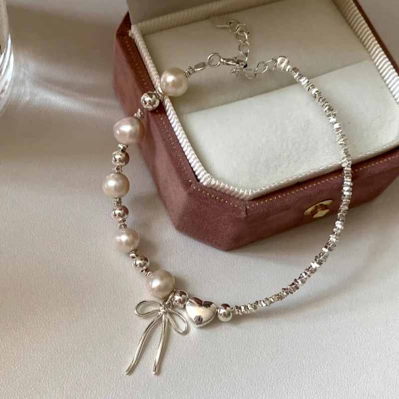 Sterling Silver Pearl And Bow Bracelets